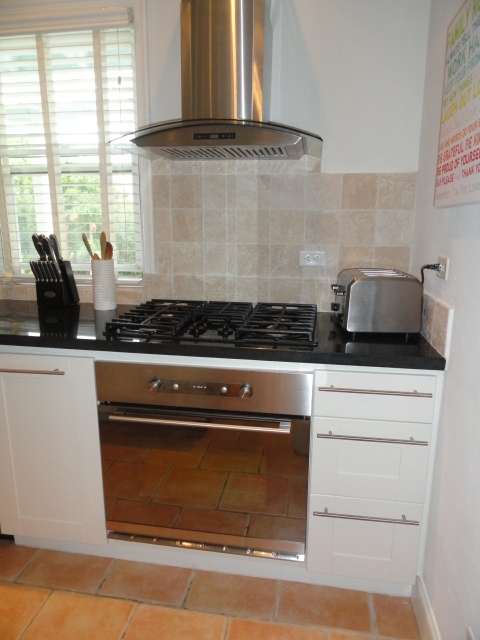 Kitchen with Ikea oven , Whirlpool cooktop