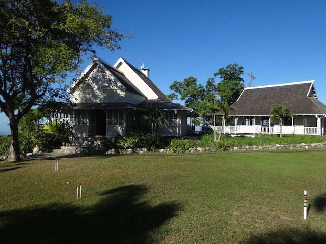 View across the croquet lawn to the dining pavilion and bar