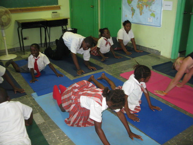 Students in the weekly yoga class