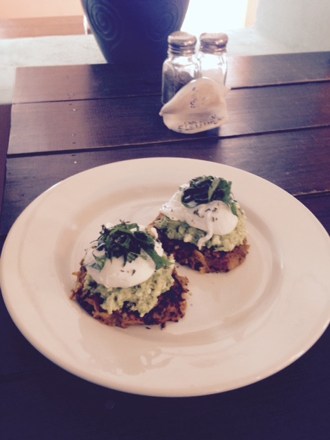Over here with that please - poached eggs on veggie cakes with avocado and feta smash....