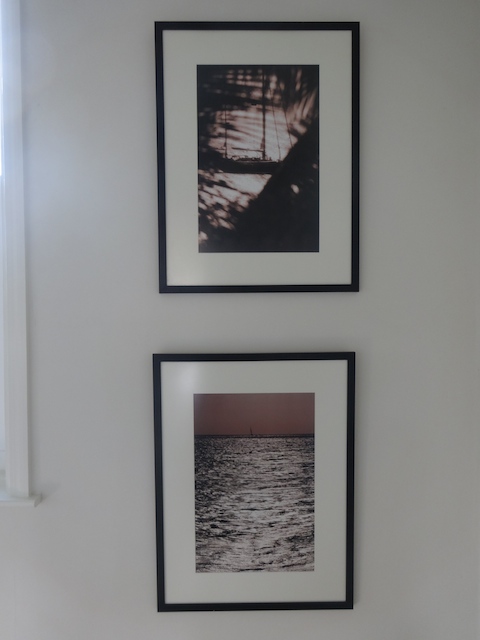 Framed photographs by the talented local photographer Marc Coeffic