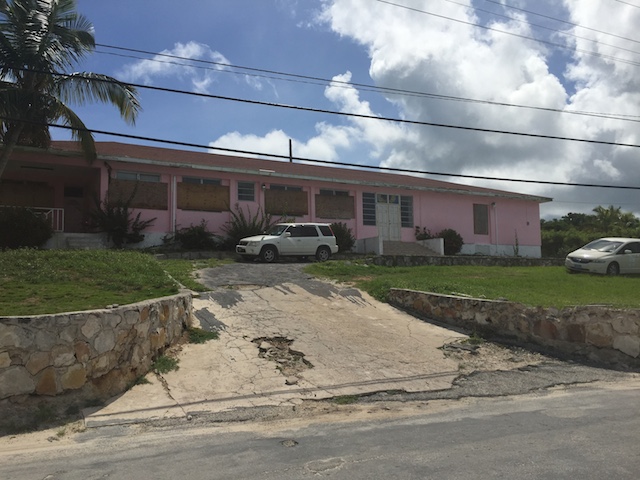 Not a very pretty shot of the clinic on Queens Highway Governors Harbour - shuttered up for Erika who never came !