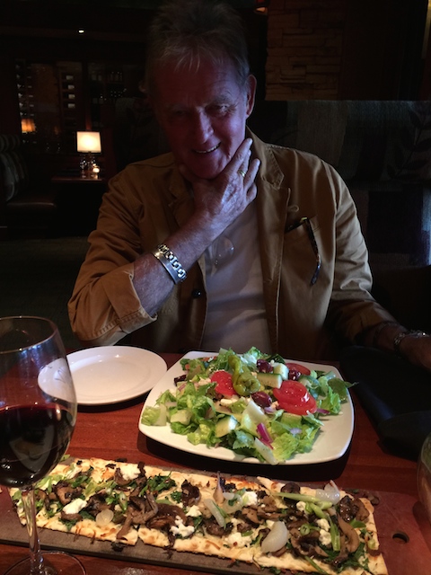 Bob posing like Dean Colman at Seasons 52 with greek salad and mushroom flatbread ....