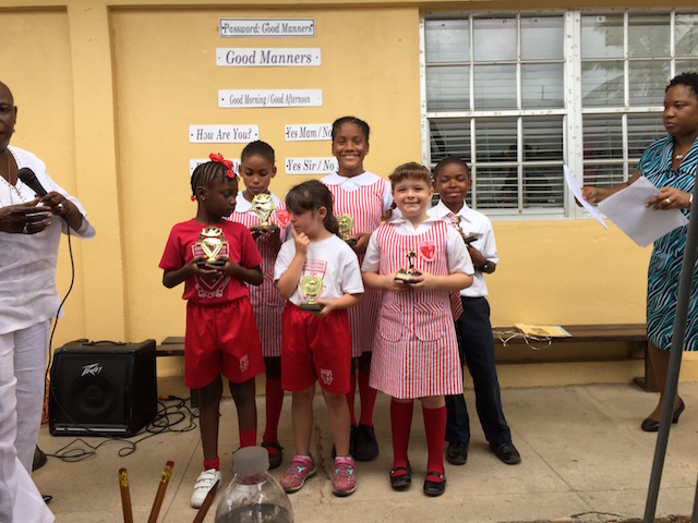 The six proud winners with their trophies - 1st, 2nd and 3rd in the two age groups