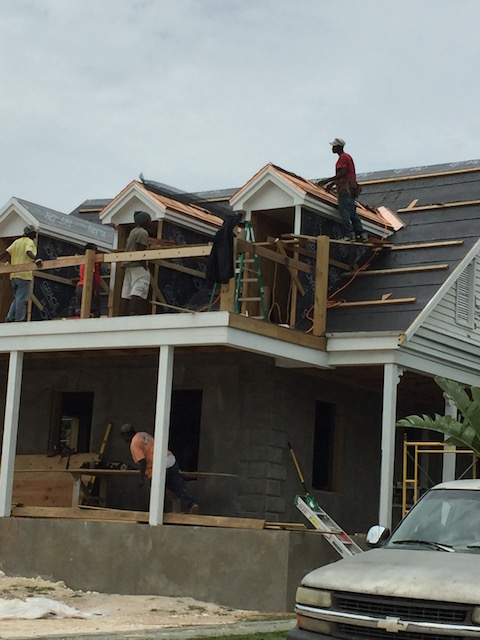 Flora's Cottage roof being shingled