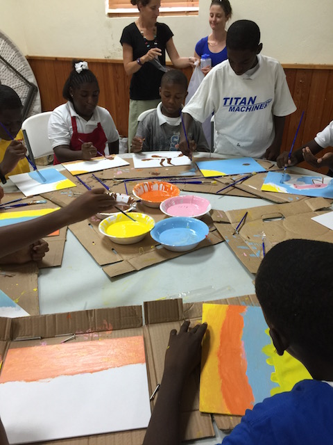 Younger students having a great painting session