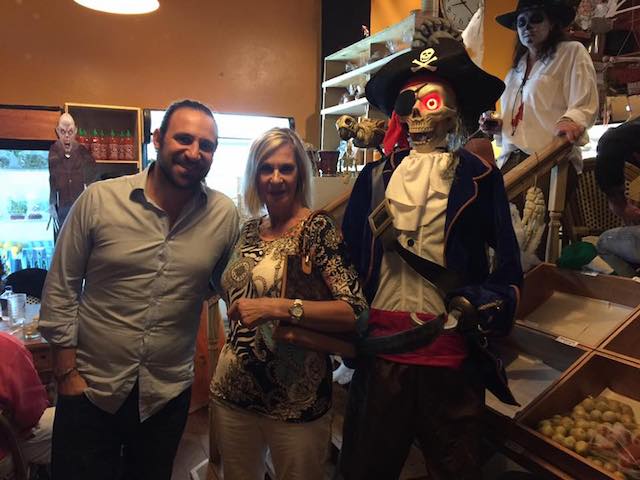 Lesley Alticosalian with her son and the pirate at the door 