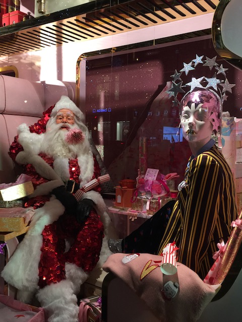 Santa looking very happy in another Selfridges window.....