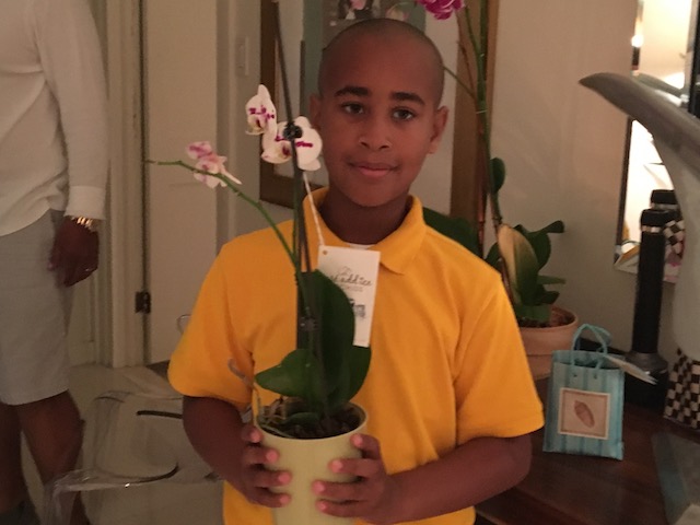 Jules Carey with a lovely orchid for Mary 