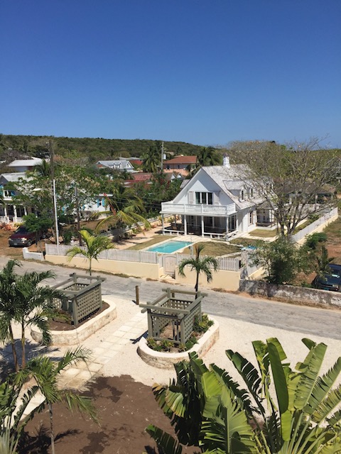 Looking over the parking area to the newly restored house owned by Tom and Judy Whitehead from Nassau.