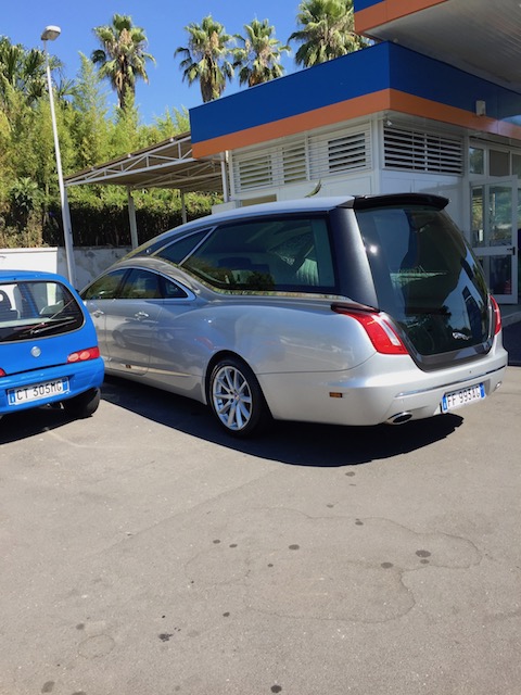 Stylish to the very end ! This was a hearse we spotted in Sicily - it is a converted Jaguar .......