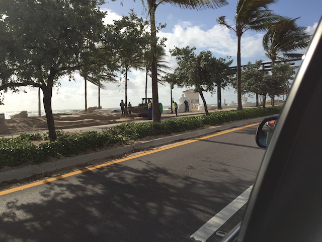 Big piles of sand moved off the road in Ft Lauderdale