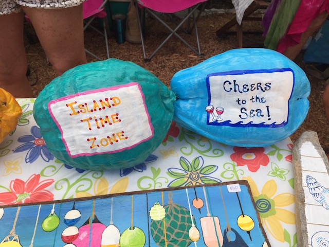I loved these fun painted coconuts - they would look good on my built in shelf units - a sample of some great work by 