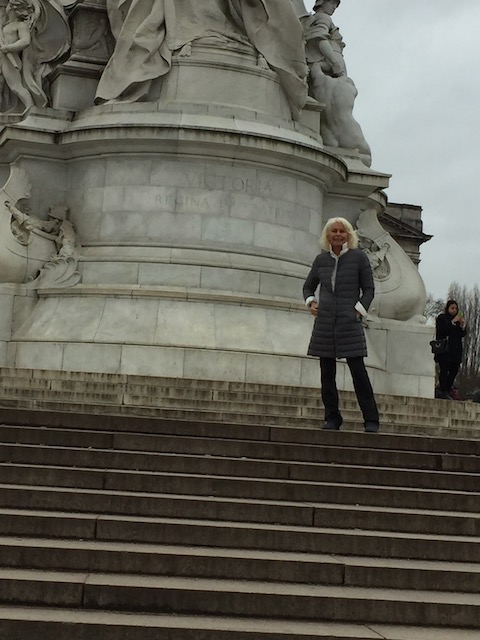 This is the statue of Queen Victoria outside Buckingham Palace - but you can't see her - only me !!