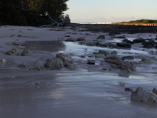 Sand is all washed out - it will come back with time but it shows the power of the tides