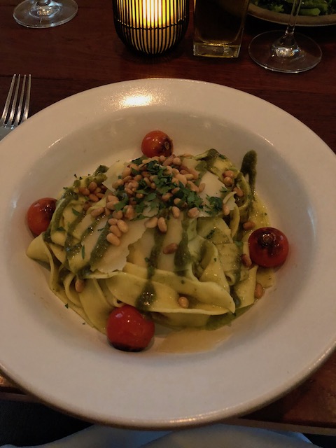 Beautiful pesto pappardelle with pine nuts, roasted tomatoes and deliciousness !