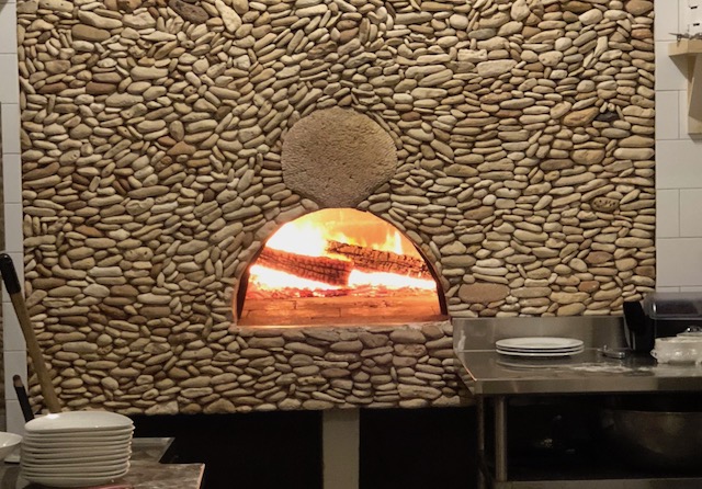 Now that's what you call a wood burning pizza oven - at La Bougainvillea