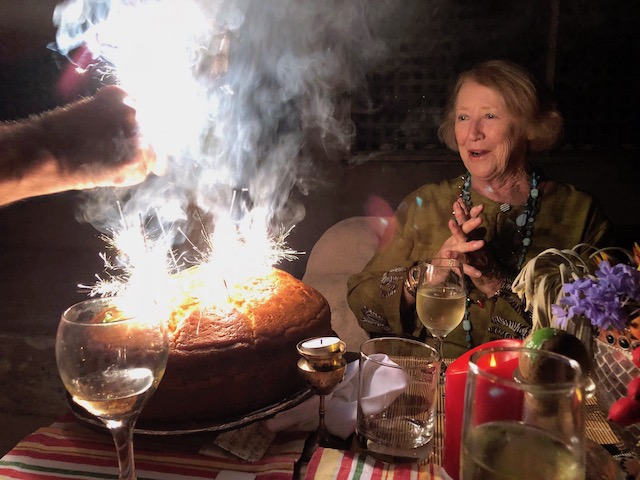 I love this picture of mary with her cake with sparklers - she could be any age between 1 and 80 given the delight on her face !