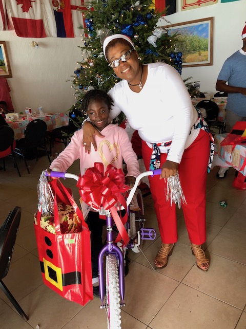 Kayla with Agatha Bethel and her new bike !