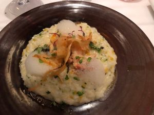 Herb risotto with Maine lobster , parsnip chips and a foam - but I can't remember what flavor ! Delicious....